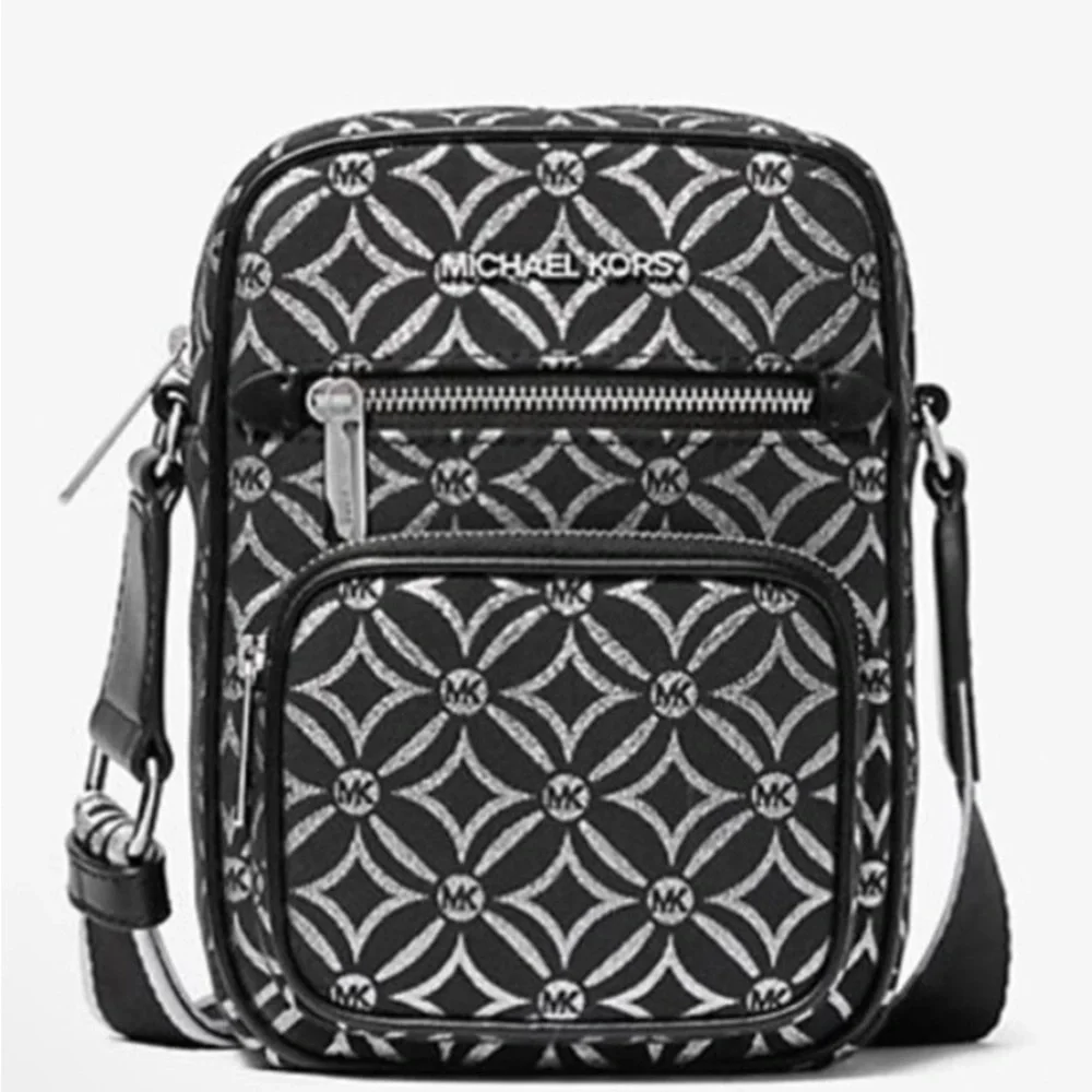 Michael Kors NWT Jet Set black and silver crossbody with guitar strap, NWT